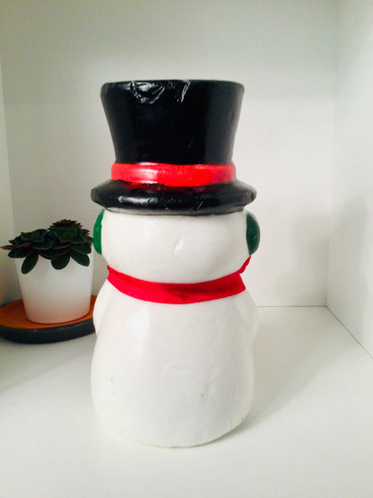 Vintage kaars in de vorm van een sneeuwman