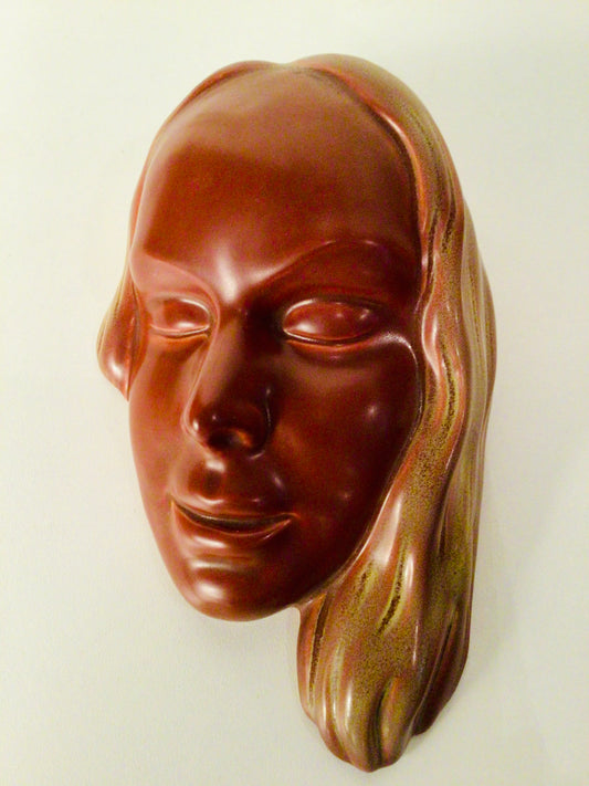 Vintage vrouwenhoofd in keramiek