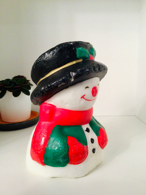 Vintage kaars in de vorm van een sneeuwman